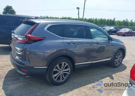 2021 Honda Cr-V Awd Touring z USA, uszkodzony, nr VIN 2HKRW2H94MH631640